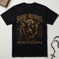 Black t-shirt with Saint Michael design and text on a light gray background