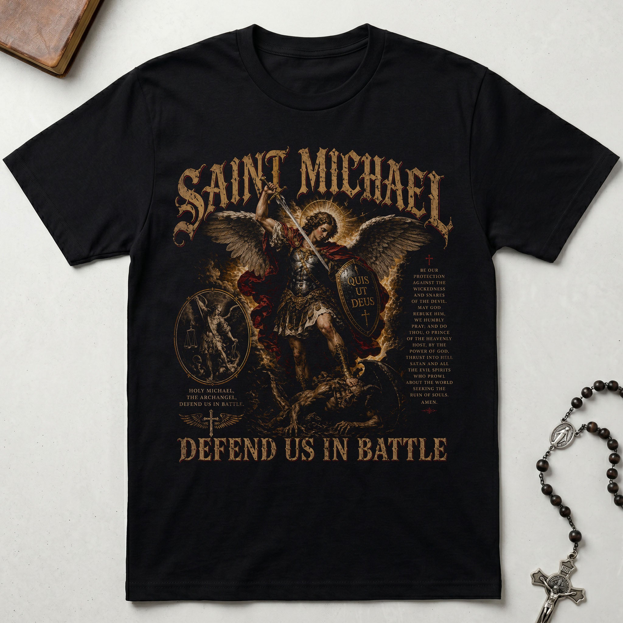 Black t-shirt with Saint Michael design and text on a light gray background